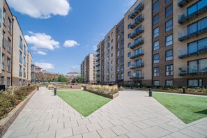 The development has a large communal courtyard and is securely gated, accessible only by its residents.
