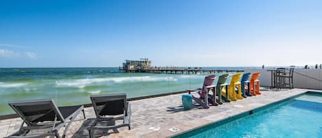 Private heated pool on the water