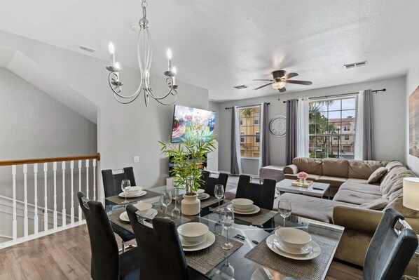 Bright Dining and Kitchen of the townhouse in Orlando Florida - Seamless connection to the kitchen for convenience - 6 Persons Dining - Elegantly curated decor that transforms spaces into havens of beauty