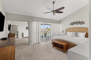 3rd level master suite with a king bed and an ensuite bath.