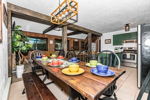 Dining for 10 at one table and Breakfast bar with 4 additional seats 