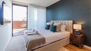 Master bedroom with a comfortable mattress and clean linen! It has direct access to the balcony, with a hanging chair #comfort #cozy