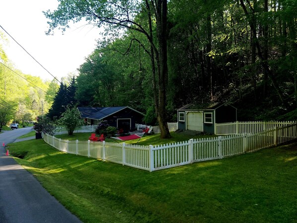 fully fenced large side yard