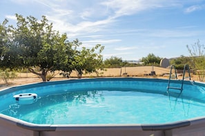 Cool off in the above ground pool on those hot summer days.