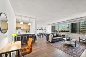 This open-concept living space seamlessly connects the living, dining, and kitchen areas, offering plenty of room for you to relax, entertain, and enjoy quality time with loved ones.