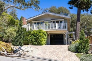 Front of house with wide balcony