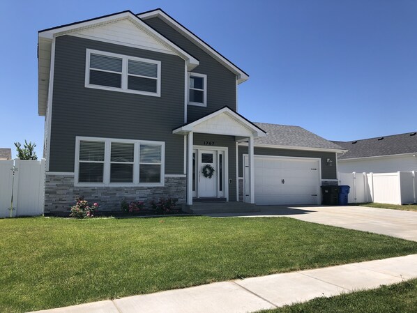 Home exterior, two car garage is available for guests to park vehicles