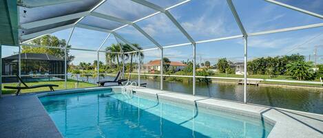 Cape Coral Vacation Rental | 4BR | 2BA | 1,777 Sq Ft | Small Step for Entry