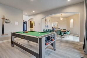Convenience at Its Best! The Game Room is Just Steps Away from the Dining Area, Kitchen, and Living Room.
