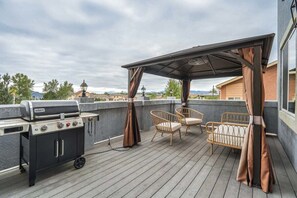 Outdoor Bliss Awaits! Step Onto the Balcony with a Patio and BBQ Grill. Gather Around the Beautiful, Cozy Chairs and Enjoy the Spacious Area.