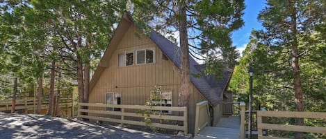 Cozy Chalet surrounded by pines.