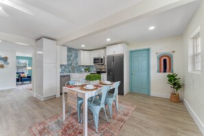 The open kitchen design has plenty of room to prepare meals. The perfect place to entertain family and friends. REFRIGERATOR INCLUDED but was not delivered prior to picture day.