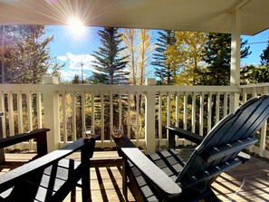 Covered Balcony - 
Relax on our cozy covered balcony, an ideal nook for unwinding and soaking in some mountain time.
