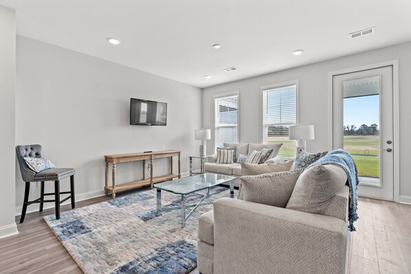 Plenty of space in this living room to gather and spend time together!