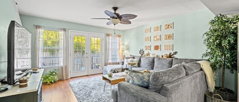 The private patio off the main living room invites you to step outdoors.