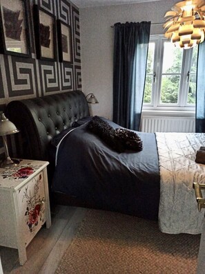 Master bedroom with wardrobe and draw space.