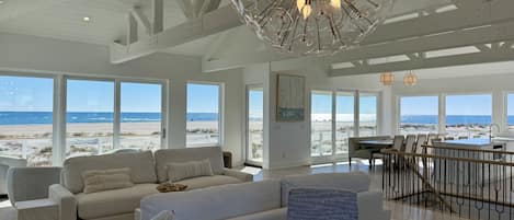 Spacious great room with panoramic ocean & sound views, opens to deck. Seats 34+