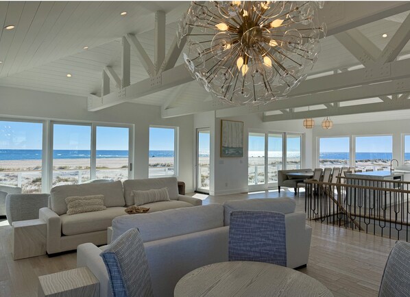 Spacious great room with panoramic ocean & sound views, opens to deck. Seats 34+