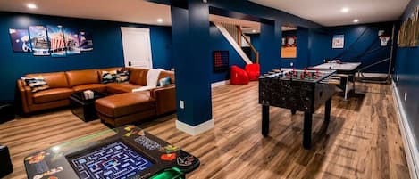 Game Room including Arcade, Foosball, Air Hockey, Basketball, Connect 4 and Darts. Home Theater Space with premium leather seating. 