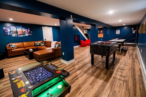 Game Room including Arcade, Foosball, Air Hockey, Basketball, Connect 4 and Darts. Home Theater Space with premium leather seating. 