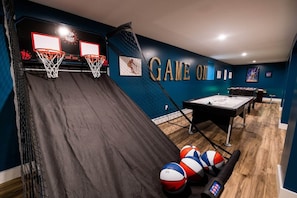 Game area including basketball, air hockey, foosball and arcade