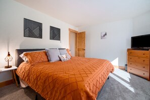 The bedroom has a King size bed