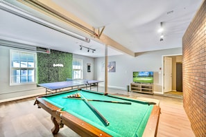 Game room with pool table, ping pong, and PS4.