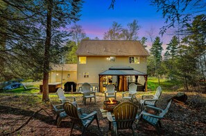 Fire pit nestled in by surrounding nature