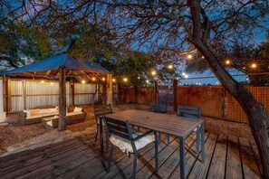 Backyard with plenty of seating areas to enjoy