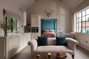 The lounge kitchen area at Blacksmith's Cottage, Cheshire