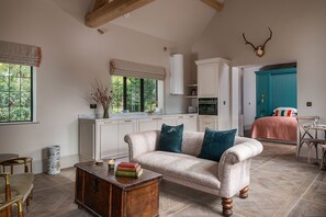 The lounge kitchen area at Blacksmith's Cottage, Cheshire