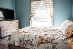 Second bedroom – with large queen bed, TVs and lots of closet and dresser space