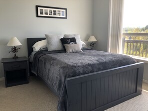 Primary bedroom with views of the Bay