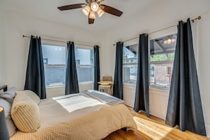 Bedroom 2 with queen-size bed, large closet and blackout drapes