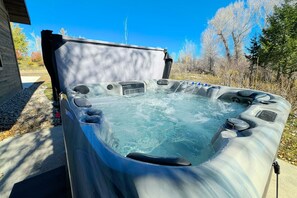 Soak your cares away in the private hot tub — it is the perfect way to relax during your time here.