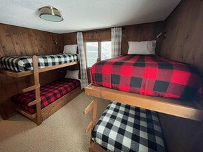 Bunk room complete with a reading light & cozy Pendelton blanket for each bed. 