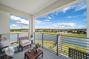 Balcony 4th Floor with LAKE and BOARDWALK view#Disney #Parks #kingdom #springs #StoreyLake #resort #Apartment #Vacation #Rental #waterpark #Kissimmee #Orlando #universal #citywalk