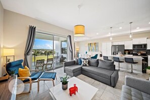 Modern Open Layout blends Kitchen, Dining and Living Room!#Disney #Parks #kingdom #springs #StoreyLake #resort #Apartment #Vacation #Rental #waterpark #Kissimmee #Orlando #universal #citywalk