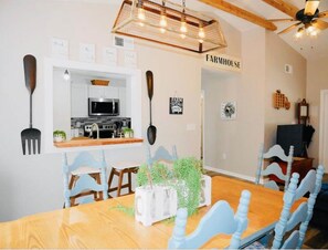 Large dining table in Country style dining Room.