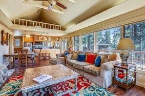 Cottage interior with view of upstairs loft