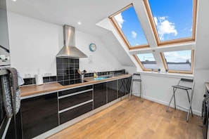 Fully equipped kitchen with all essentials to enjoy a home-cooked meal
