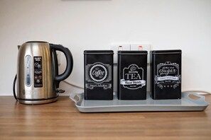 Brew up a fresh cup of coffee and enjoy the complimentary add-ons provided at our coffee station.