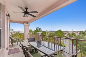 Enjoy the Expansive Balcony Equipped with Comfortable Outdoor Furniture for Unwinding and Taking in the Scenic Views.