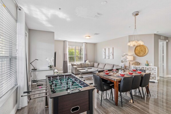 Spacious living room with foosball table