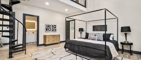 Bedroom with King bed, private en-suite, Smart TV, and additional loft bedroom