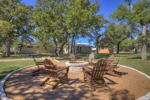 Gather around the firepit on a chilly evening.