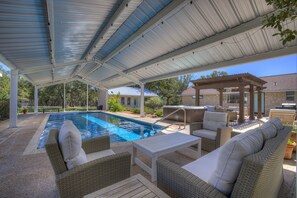 Relax in the shade after a dip in the pool.