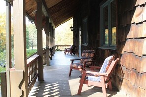 The covered porch is the perfect place to enjoy your favorite beverage.