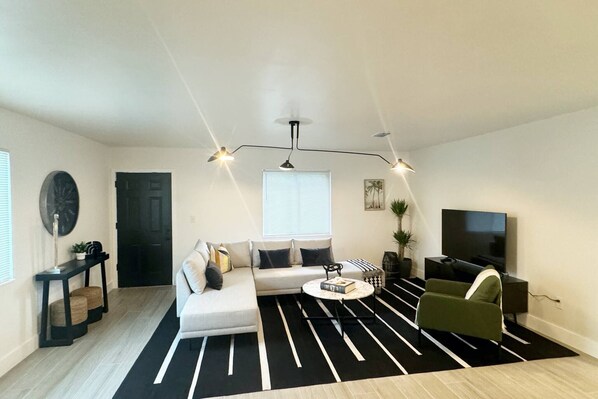 Living room with sectional sofa and Flat Screen TV