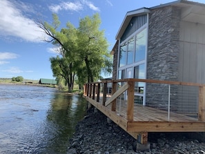 Front Deck, facing North Platte River & Treasure Island, fish for trout of all kinds.